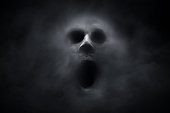 istock Scary ghost on dark background 1334434982
