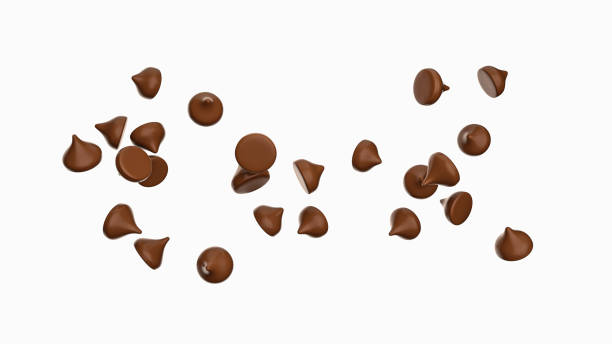 Scattering of tasty chocolate chips on white background 3d illustration stock photo