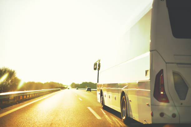 scene of trip on tourist bus by highway stock photo