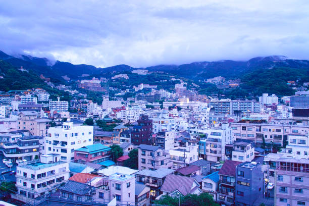 Scenery of a hot spring town at dusk in Atami stock photo