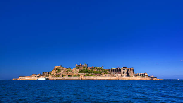 Scenery of Gunkanjima island in Nagasaki prefecture, Japan This is the scenery of Gunkanjima island in Nagasaki prefecture, Japan.
This island is known for famous sightseeing spots in this prefecture, many people go this island by various local sightseeing tour in every year. hashima island stock pictures, royalty-free photos & images