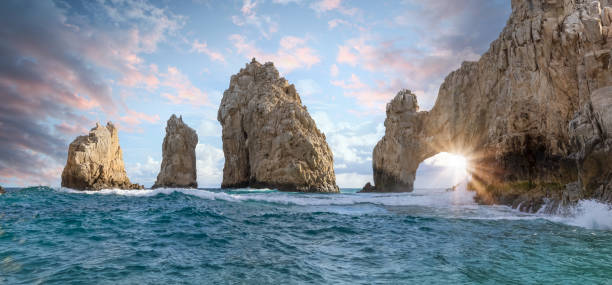 Scenic landmark tourist destination Arch of Cabo San Lucas, El Arco, whale watching and snorkeling spot stock photo