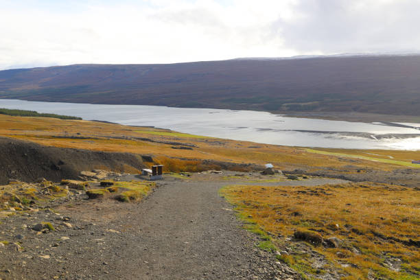 Scenic landscape near the trail leading to the Litlanesfoss and Hengifoss waterfalls. Footpath and viewpoint near the trail stock photo