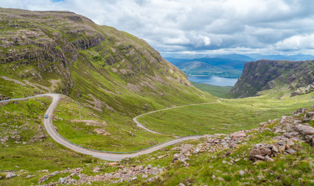 Scenic sight near Bealach na Ba viewpoint, in Applecross peninsula in Wester Ross, Scottish Higlands. Scenic sight near Bealach na Ba viewpoint, in Applecross peninsula in Wester Ross, Scottish Higlands. peninsula stock pictures, royalty-free photos & images