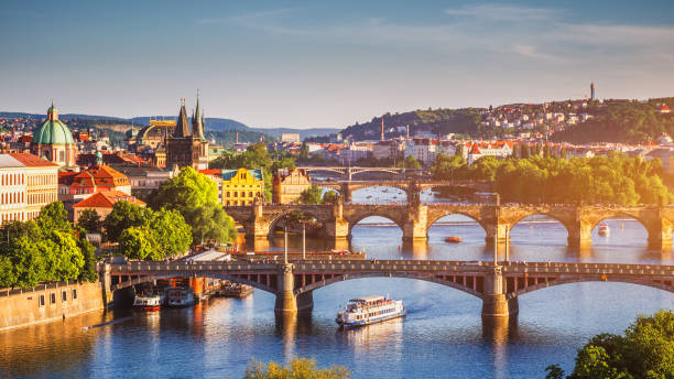Scenic spring sunset aerial view of the Old Town pier architecture and Charles Bridge over Vltava river in Prague, Czech Republic Scenic spring sunset aerial view of the Old Town pier architecture and Charles Bridge over Vltava river in Prague, Czech Republic prague stock pictures, royalty-free photos & images
