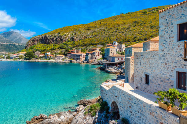 Scenic view at the picturesque village of limeni with the beautiful alleys,turquoise waters and the characteristic stone tower buildings. stock photo