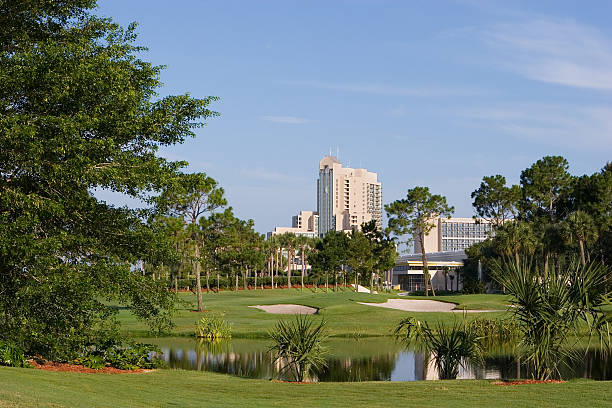 Scenic view of a resort golf course with hotel background stock photo