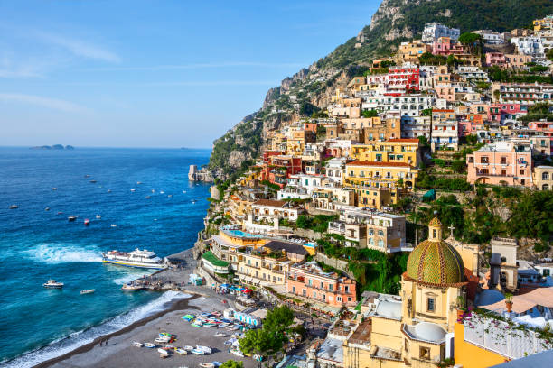 Scenic view of Positano in sunny day, Amalfi Coast (Province of Salerno),  Campania, Italy. stock photo