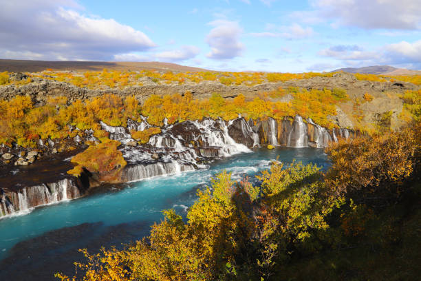 A scenic view of the Hraunfossar waterfalls, located near Husafell and Reykholt in West Iceland. stock photo