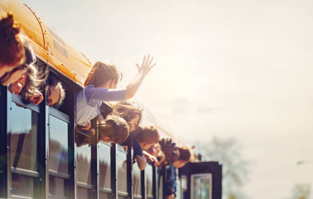 School kids in a bus School kids in a bus back to school stock pictures, royalty-free photos & images