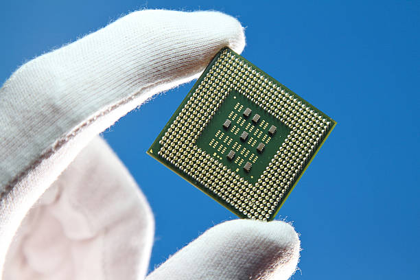 Scientist holding Computer Chip stock photo