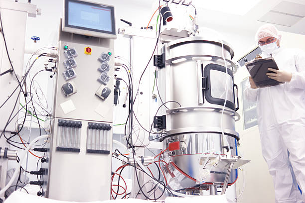 scientist with bioreactor stock photo