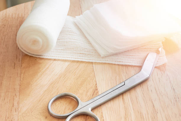 scissors with bandage on table gauze stock photo