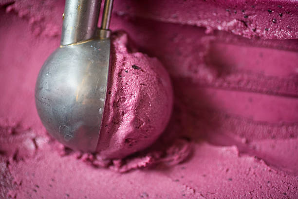 Scoop of blueberry ice cream stock photo