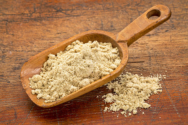 scoop of rice bran stock photo
