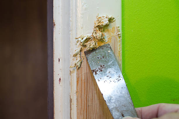 Scraping Off Paint stock photo