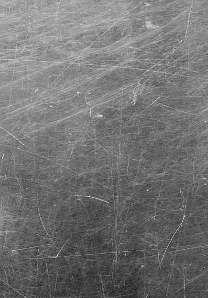 Scratched glass surface. stock photo