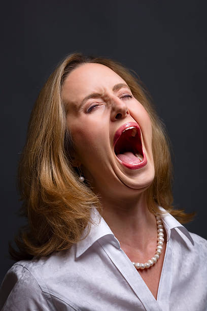 Screaming in pain stock photo