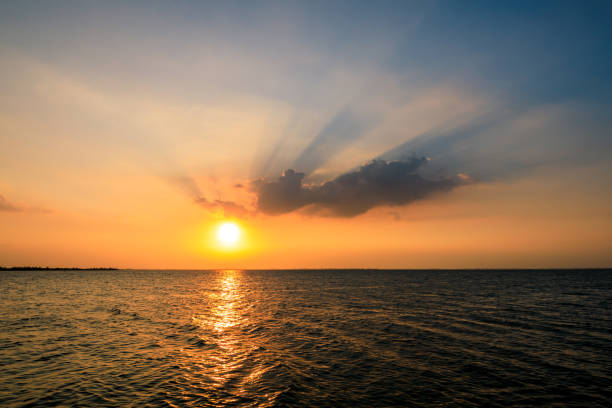 Sea and sky natural scenery at summer sunset stock photo