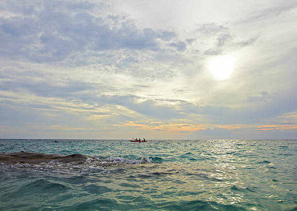 Sea ocean landscape - water waves, sun, clouds sky stock photo