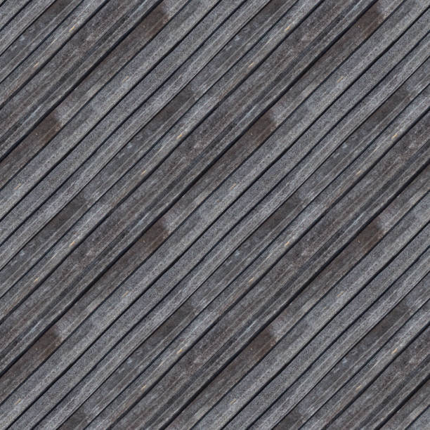Seamless pattern of wooden planks wall Seamless pattern of old grey wooden plank wall or pavement for design and matte painting xylo stock pictures, royalty-free photos & images