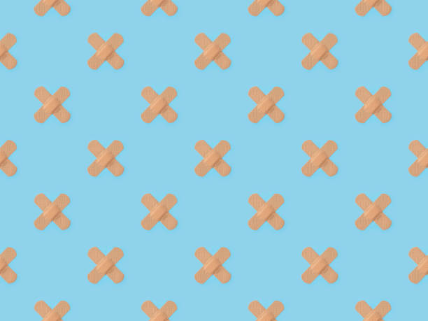 Seamless repetitive Band-aid on blue background stock photo