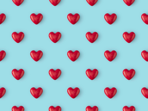 Seamless repetitive Red Heart Shape on blue background