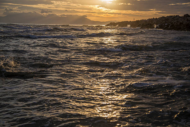 Seashore sunsets colors scenery stock photo
