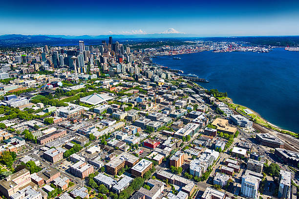 Seattle Downtown and Metro Area Wide Angle Aerial View An aerial view of the downtown area and the surrounding neighborhoods of Seattle, Washington. king county washington state stock pictures, royalty-free photos & images