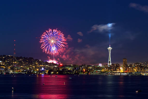 Seattle in the evening of 4th of July with fireworks. stock photo