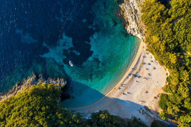 Secluded mediterranean beach Rovinia near Paleokastritsa, Corfu stock photo