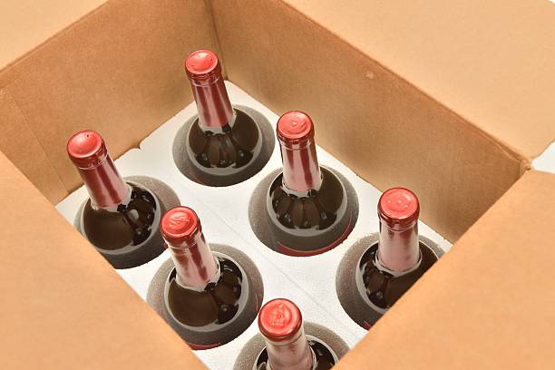 Secure shipping of wine bottles in a box stock photo
