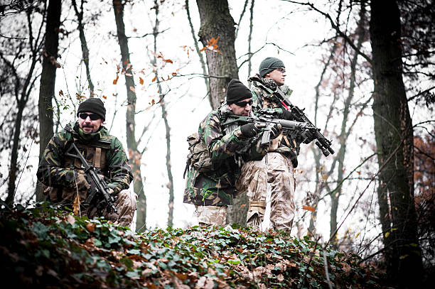 Secured position Scouting team at secured spot militia stock pictures, royalty-free photos & images