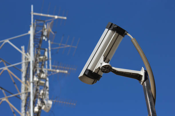 security camera and satellite structure stock photo