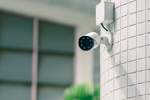 Security IR camera for monitor events in city. stock photo