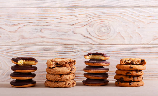 Selection of girl scout cookies Selection of girl scout cookies over white wooden background cookie stock pictures, royalty-free photos & images