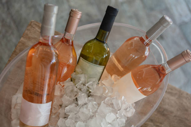 Selection of wine on ice Selection of wine on ice frozen rose stock pictures, royalty-free photos & images