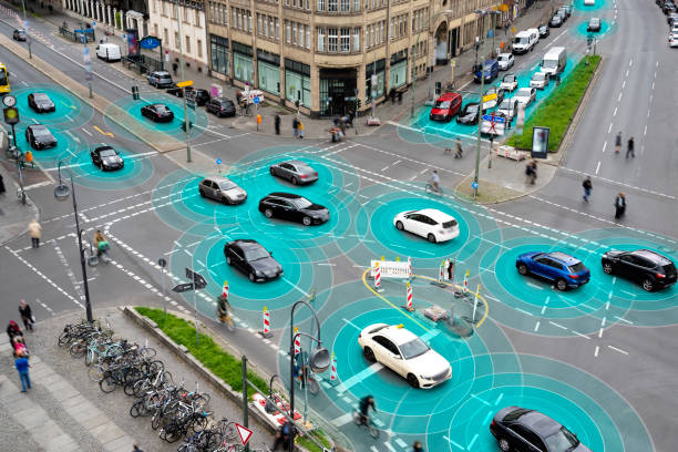 Self Driving Cars Navigating a Busy City Intersection stock photo