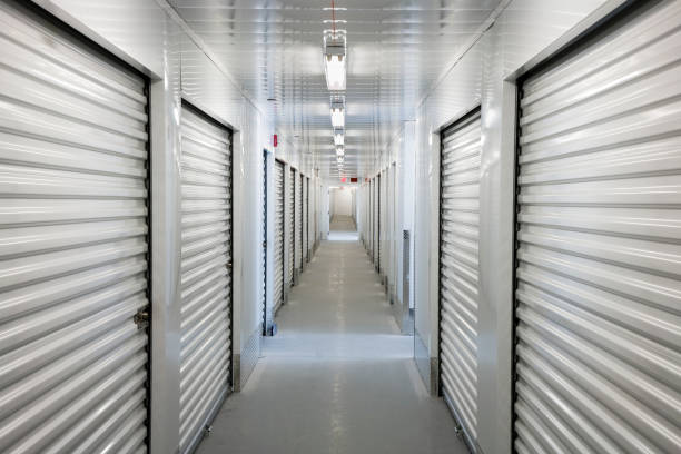 Self storage units A perspective view down a corridor of storage units self storage stock pictures, royalty-free photos & images