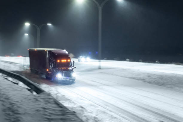Semi Truck on Highway in Winter stock photo