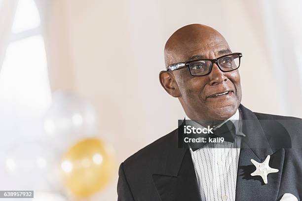 Senior African American man wearing a tuxedo