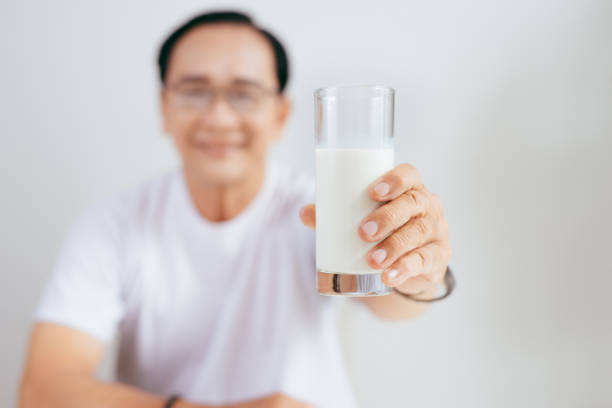 2,297 Asian Man Drink Milk Stock Photos, Pictures & Royalty-Free Images -  iStock