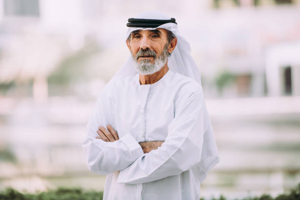 Senior business man in Dubai Senior business man in Dubai old arab man stock pictures, royalty-free photos & images