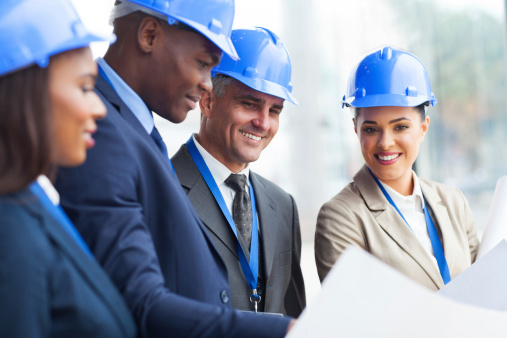 Senior Construction Manager Working With Team Stock Photo Download Image Now iStock