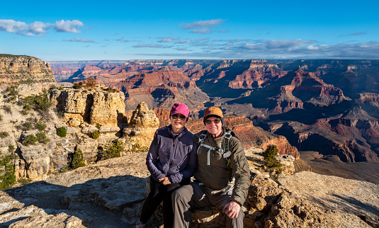 senior couple taking a selfie on the south Rim of the Grand Canyon national park