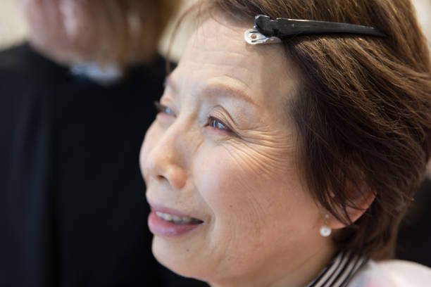 Senior Japanese woman makeover stock photo