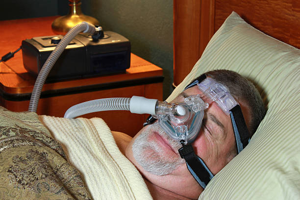 Senior Man with CPAP stock photo