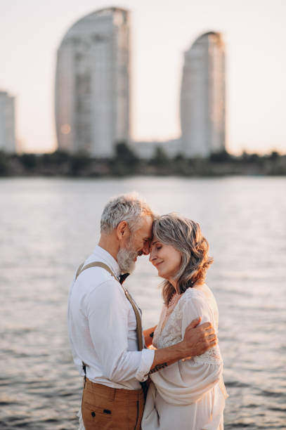 Senior newlyweds hug. stock photo