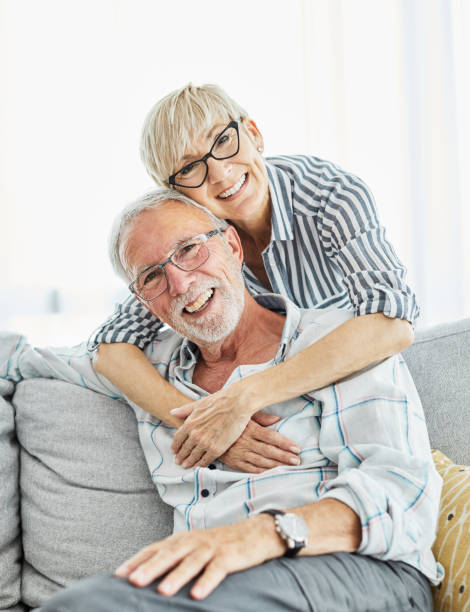 senior portrait woman man couple happy  retirement smiling love elderly lifestyle old together stock photo