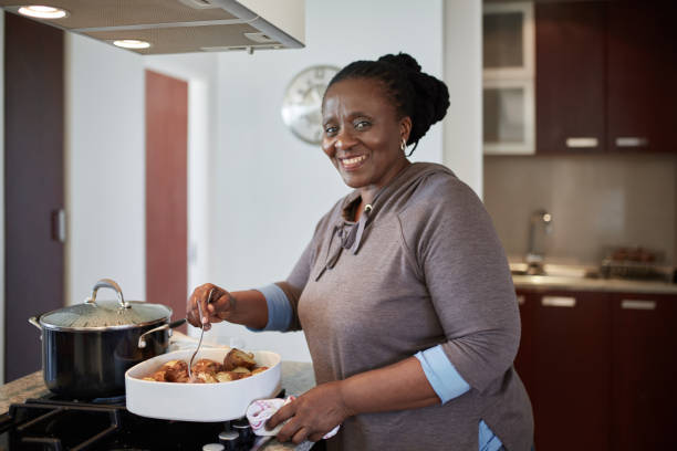 2,298 Old Black Woman Cooking Stock Photos, Pictures &amp; Royalty-Free Images  - iStock